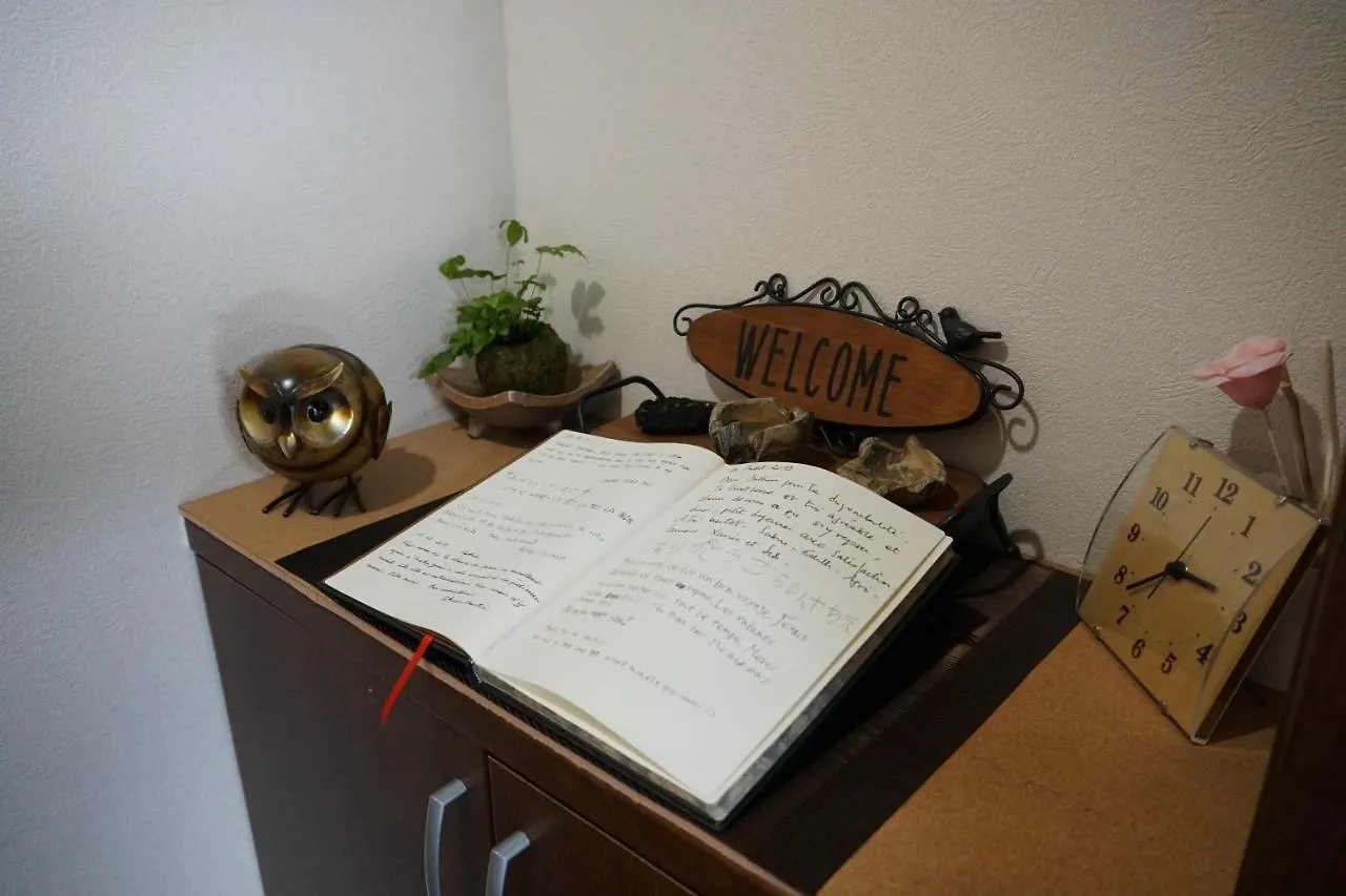 Гостевой дом Auberge Du Tanuki Noir Maison D'Hotes Осака