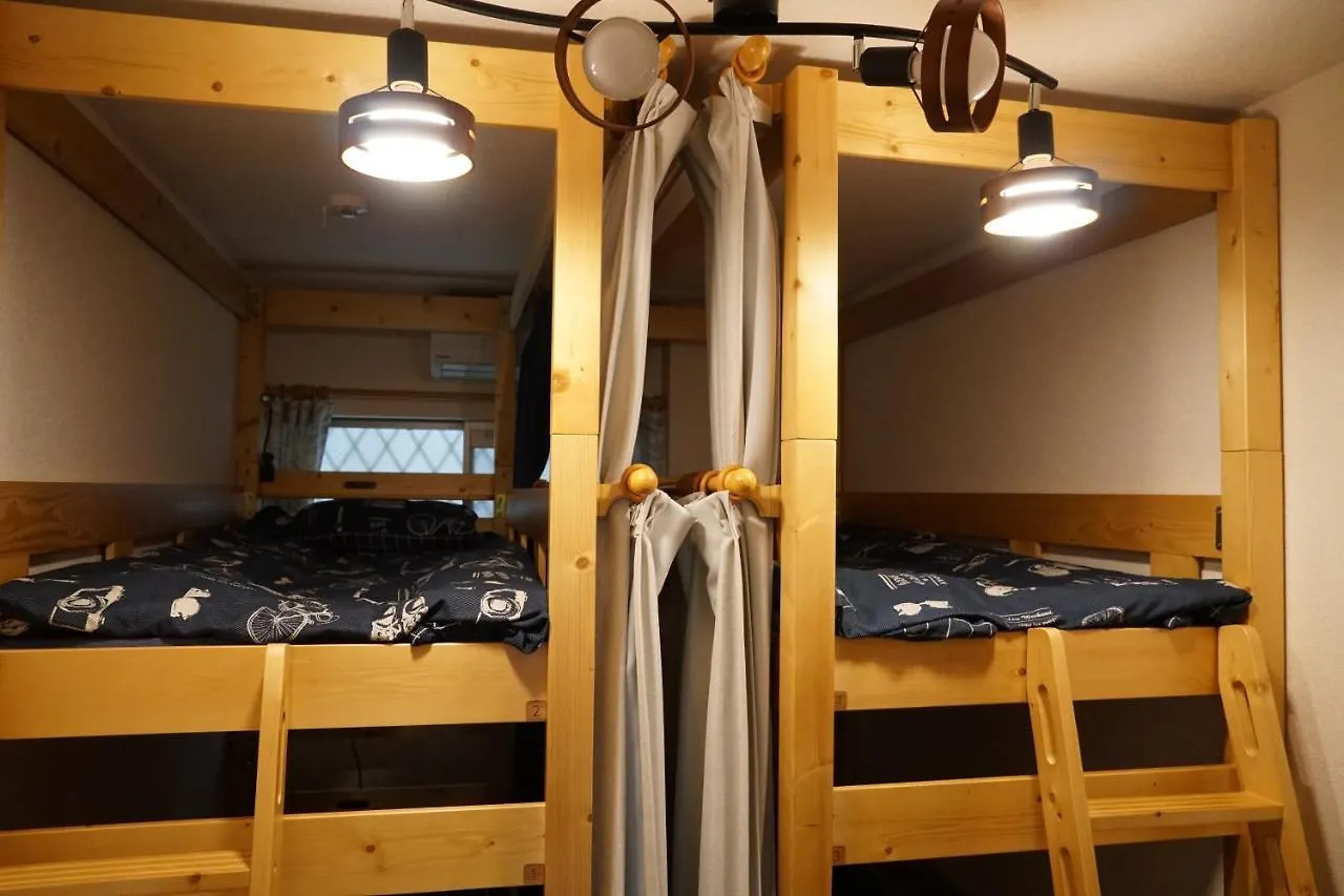 Гостевой дом Auberge Du Tanuki Noir Maison D'Hotes Осака