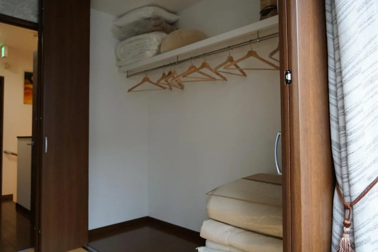 Auberge du Tanuki Noir Maison d'Hôtes Ōsaka